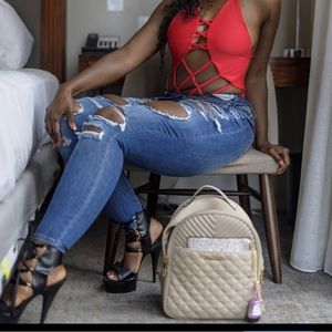 High Rise Distressed Skinny Jeans